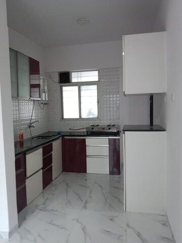Kitchen in 2 BHK Apartment at Silver Woods Wakad, Wakad – for Rent