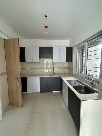 Kitchen in 3 BHK Apartment at Soham Crystal Spires, Ghodbunder Road – for Rent