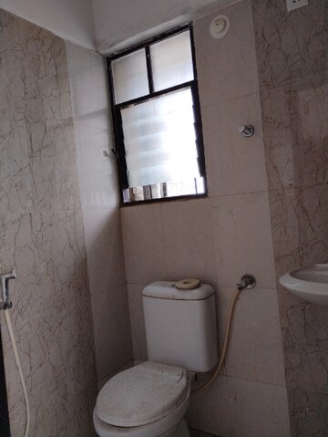 Bathroom in 2 BHK Apartment at Ratan Neptune, Hadapsar – for Sale