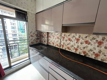 Kitchen in 1 BHK Apartment at DB Parkwoods, Kasarvadavali – for Rent