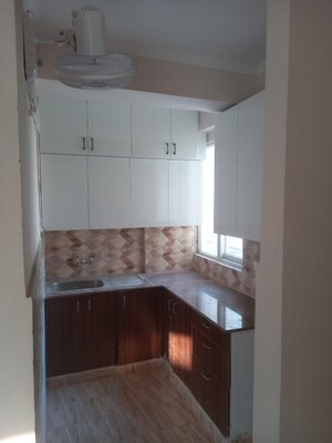 Kitchen in 3 BHK Apartment at Amrapali Golf Homes, Sector 4 Greater Noida – for Sale