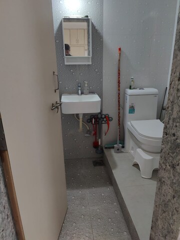 Bathroom in 2 BHK Apartment at Amrut Runwal Daffodils, Nibm – for Rent