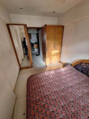 Bedroom in 2 BHK Apartment at Accord CHS Andheri West, Andheri West – for Rent