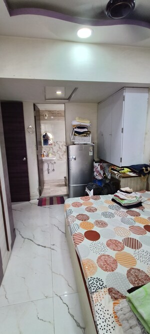 Master Bedroom in 1 BHK Apartment at Vas Pushp Vinod 2, Borivali West – for Sale