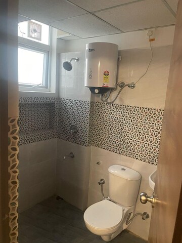 Bathroom in 2 BHK Apartment at NK Sharma Savitry Greens 2, Ghazipur – for Rent