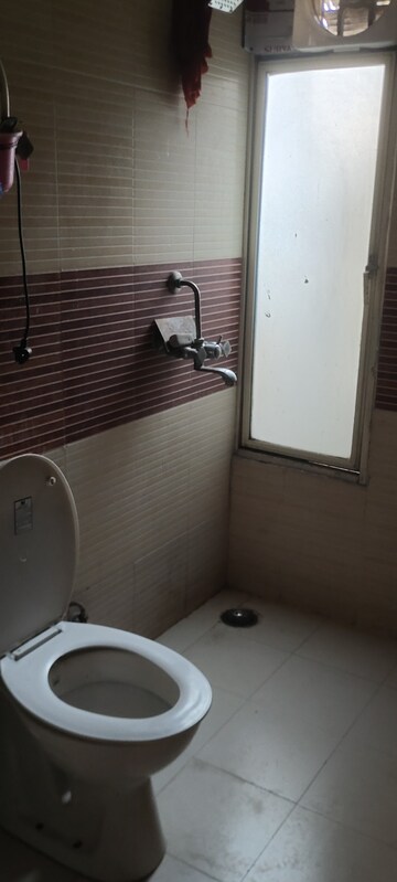 Bathroom in 3 BHK Apartment at Keltech Golf Vista, Dundahera – for Rent