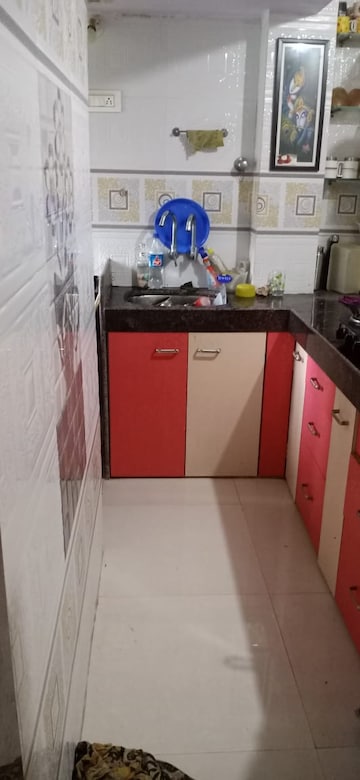 Kitchen in 1.5 BHK Apartment at Swastik Enclave Brahmand, Brahmand – for Rent