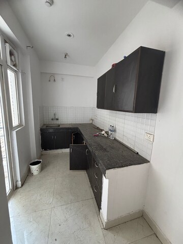 Kitchen in 2 BHK Apartment at Wall Rock Aishwaryam, Sector 16c Greater Noida – for Sale