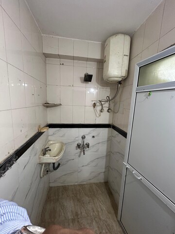 Bathroom in 2 BHK Apartment at Akhurath CHS, Sanpada – for Sale