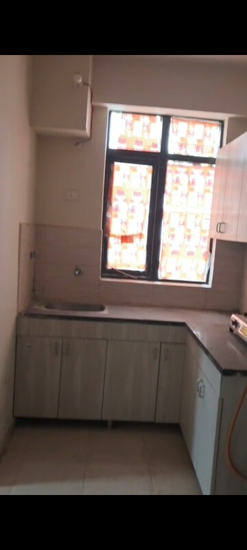 Kitchen in 1 BHK Apartment at Auric City Homes, Sector 82 – for Sale