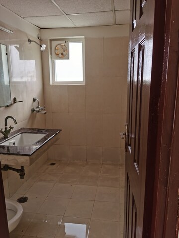 Bathroom in 3.5 BHK Apartment at Paramount Floraville, Sector 137 – for Rent