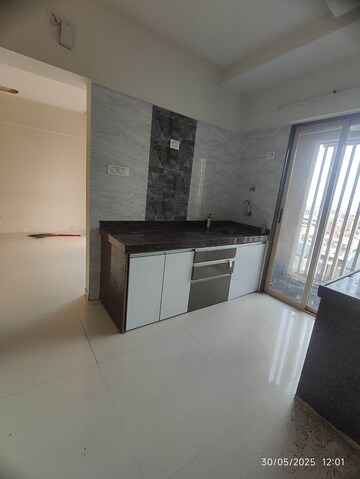 Kitchen in 2 BHK Apartment at Ekta Brooklyn Park, Virar West – for Rent
