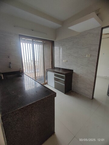 Kitchen in 2 BHK Apartment at Ekta Brooklyn Park, Virar West – for Rent