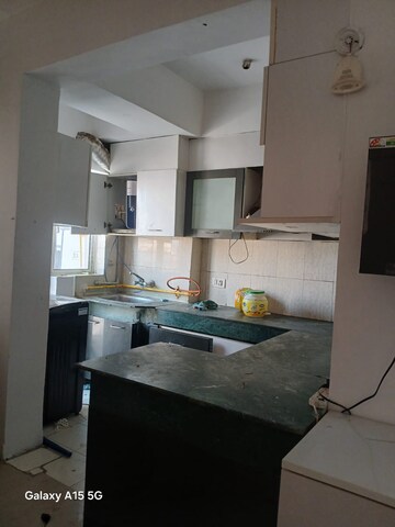 Kitchen in 2.5 BHK Apartment at Paras Tierea, Sector 137 – for Rent