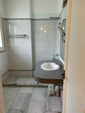 Bathroom in 3 BHK Builder Floor at Defence Colony – for Rent