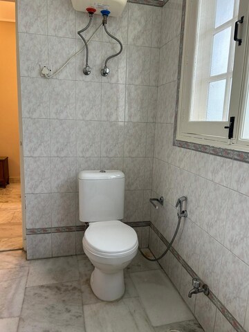 Bathroom in 3 BHK Builder Floor at Defence Colony – for Rent