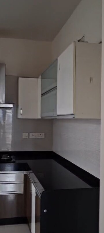 Kitchen in 2 BHK Apartment at Nyati Enchante, Wadgaon Sheri – for Rent