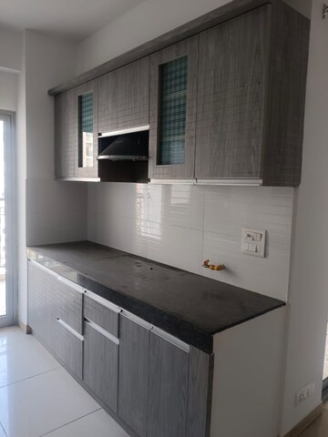 Kitchen in 2.5 BHK Apartment at Gulshan Bellina, Sector 16 Greater Noida – for Rent