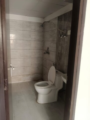 Bathroom in 2.5 BHK Apartment at Gulshan Bellina, Sector 16 Greater Noida – for Rent