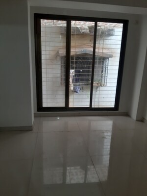 Living Room in 3 BHK Apartment at Ojass Awantika CHS, Naupada – for Sale