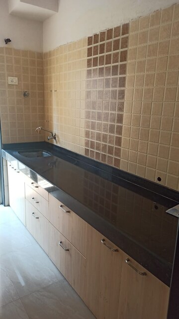 Kitchen in 2 BHK Apartment at Anchor Park, Vasai Road – for Sale