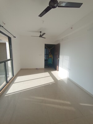 Living Room in 2 BHK Apartment at Lodha Palava River Front, Dombivli East – for Sale