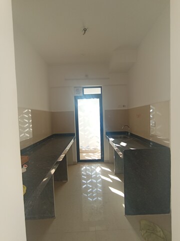 Kitchen in 2 BHK Apartment at Lodha Palava River Front, Dombivli East – for Rent