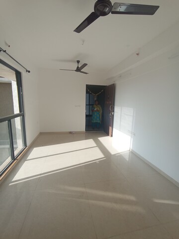 Living Room in 2 BHK Apartment at Lodha Palava River Front, Dombivli East – for Rent