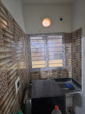 Kitchen in 1 BHK Apartment at Rahara – for Sale