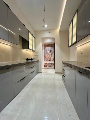 Kitchen in 2 BHK Apartment at Piramal Vaikunth, Balkum Pada – for Rent