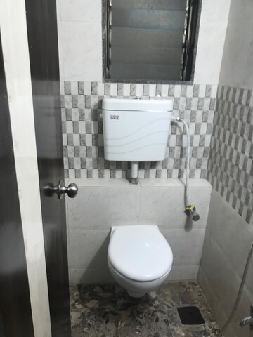 Bathroom in 2 BHK Apartment at Orchid Galaxy Apartments, Vasai East – for Rent
