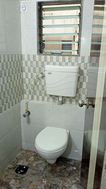 Bathroom in 2 BHK Apartment at Orchid Galaxy Apartments, Vasai East – for Rent