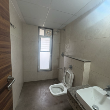 Bathroom in 3 BHK Apartment at K Raheja Reserve, Mohammadwadi – for Rent