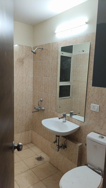 Bathroom in 3 BHK Apartment at Sare Home, Sector 92 – for Rent