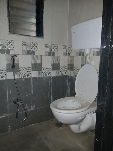 Bathroom in 1 BHK Apartment at Vastukala Niwara CHS, Goregaon West – for Rent