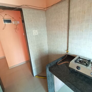 Kitchen in 2 BHK Apartment at Pushakraj CHS, Mulund East – for Rent