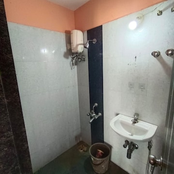 Bathroom in 2 BHK Apartment at Pushakraj CHS, Mulund East – for Rent