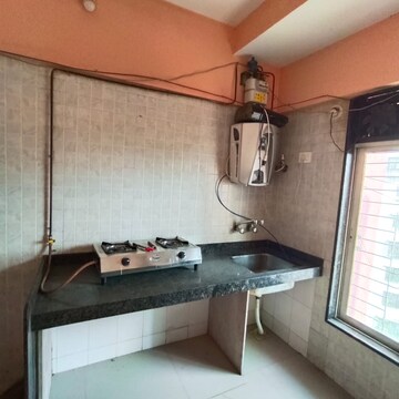 Kitchen in 2 BHK Apartment at Pushakraj CHS, Mulund East – for Rent