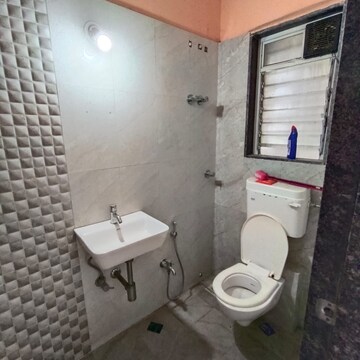 Bathroom in 2 BHK Apartment at Pushakraj CHS, Mulund East – for Rent
