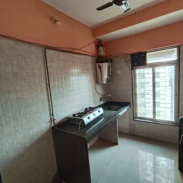 Kitchen in 2 BHK Apartment at Pushakraj CHS, Mulund East – for Rent