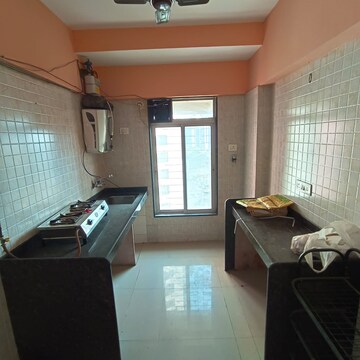 Kitchen in 2 BHK Apartment at Pushakraj CHS, Mulund East – for Rent