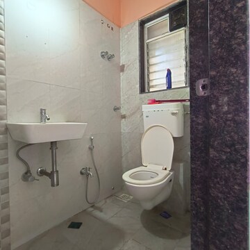Bathroom in 2 BHK Apartment at Pushakraj CHS, Mulund East – for Rent