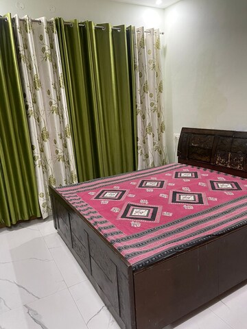 Bedroom in 2 BHK Apartment at Sushma Infinium, Ghazipur – for Rent