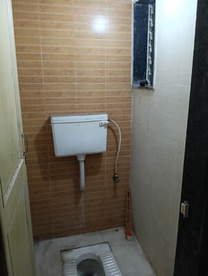 Bathroom in 1 BHK Apartment at Mansi Arcade, Dombivli West – for Sale