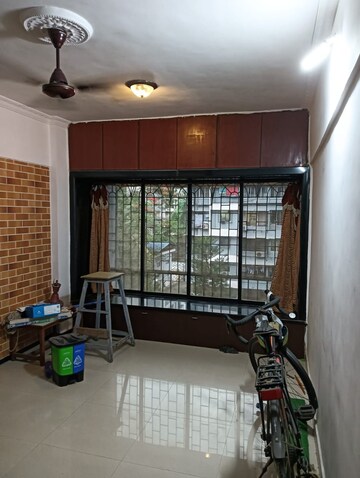 Living Room in 1 BHK Apartment at Arjun CHS Vasant Vihar, Vasant Vihar – for Rent