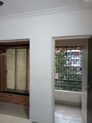 Room in 1 BHK Apartment at Arjun CHS Vasant Vihar, Vasant Vihar – for Rent