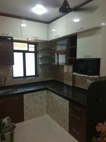Kitchen in 1 BHK Apartment at Dombivli West – for Sale