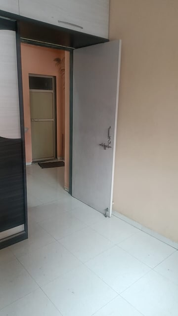 Bedroom in 1 BHK Apartment at Yashraj Park CHS, Kasarvadavali – for Rent