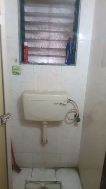 Bathroom in 1 BHK Apartment at Yashraj Park CHS, Kasarvadavali – for Rent