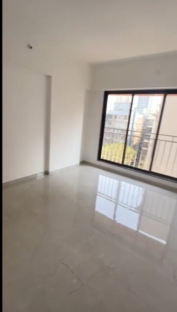 Living Room in 2 BHK Apartment at Borivali East – for Sale